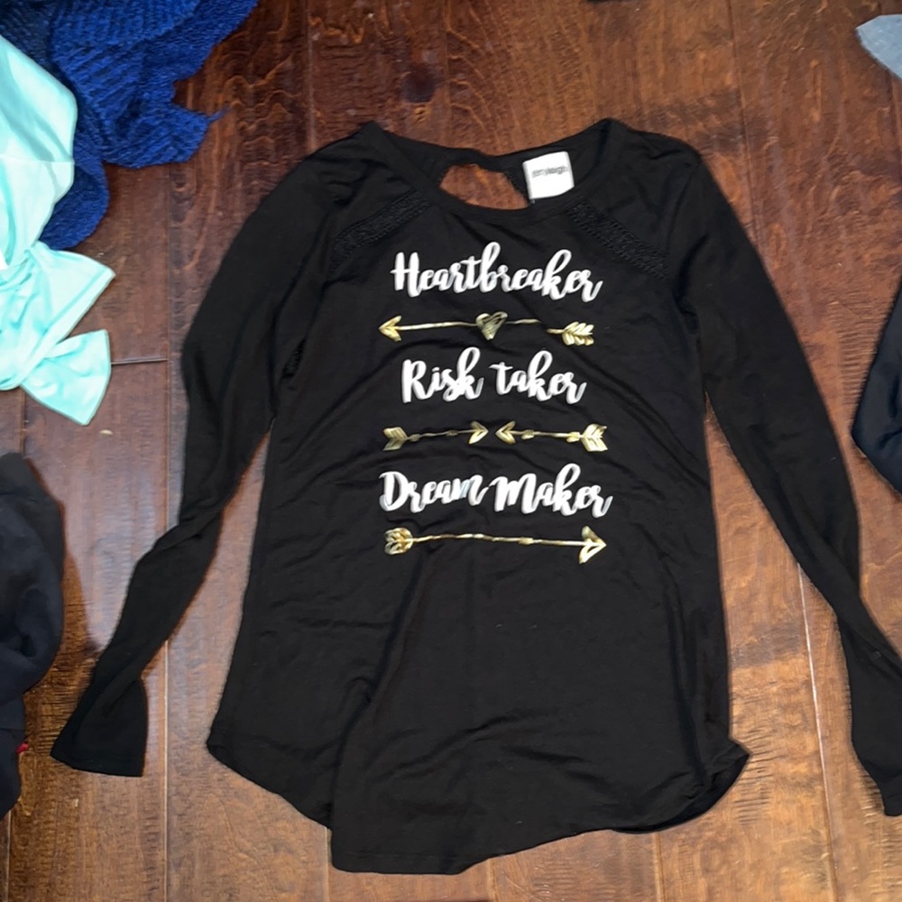 Black shirt that says heartbreaker, risk taker, dream maker